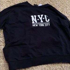 NYC woman’s sweatshirt